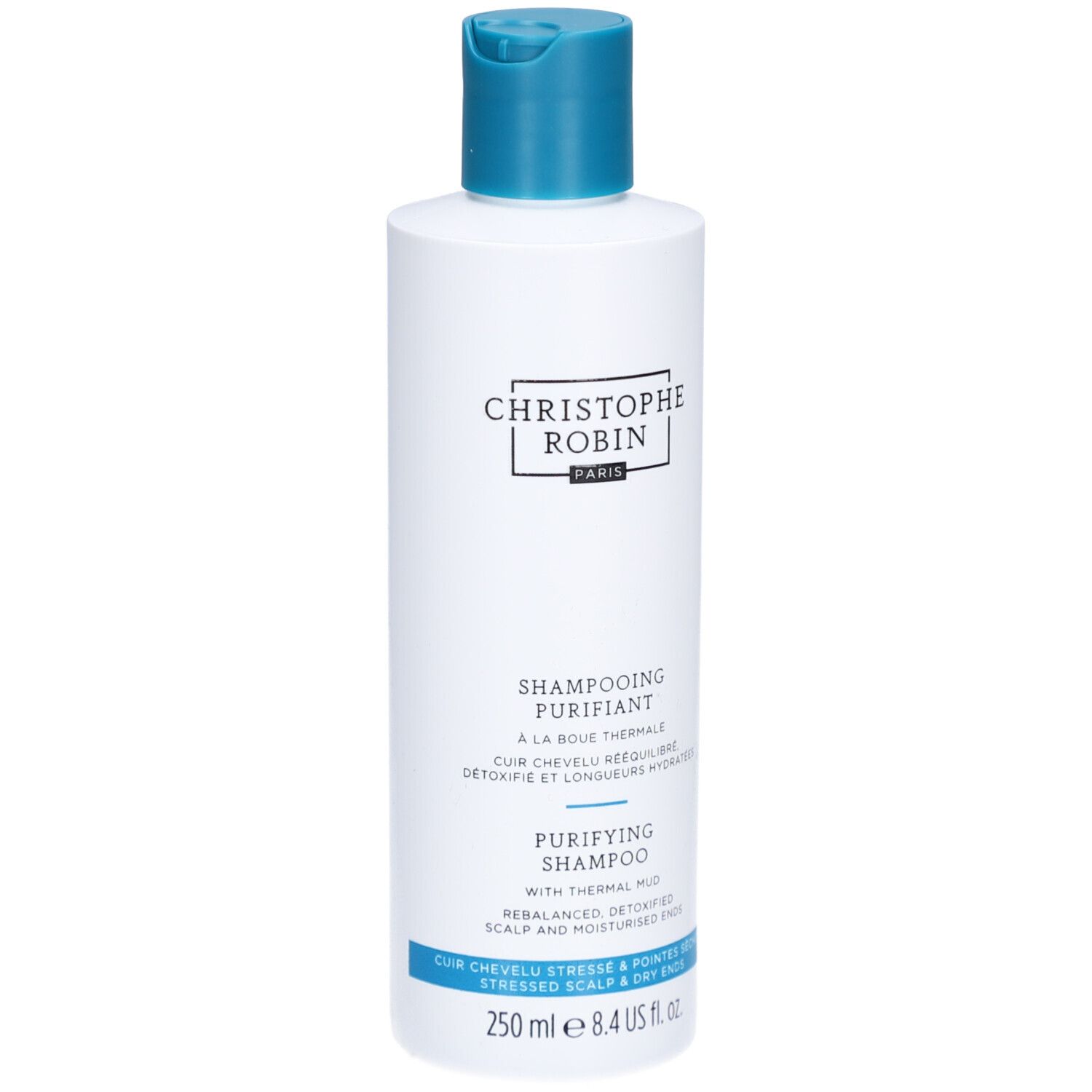 Flacon blanc, bouchon bleu. Texte: Christophe Robin, Shampooing Purifiant, 250 ml.