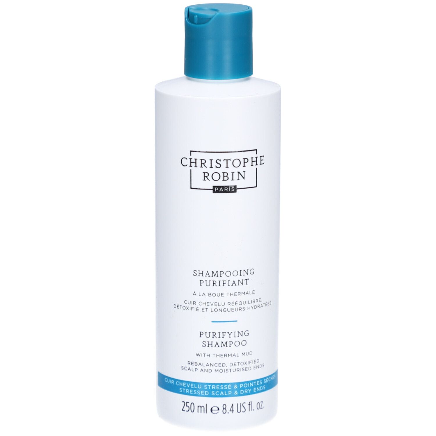 Flacon blanc, bouchon bleu. Texte: Christophe Robin, Shampooing Purifiant, 250 ml.