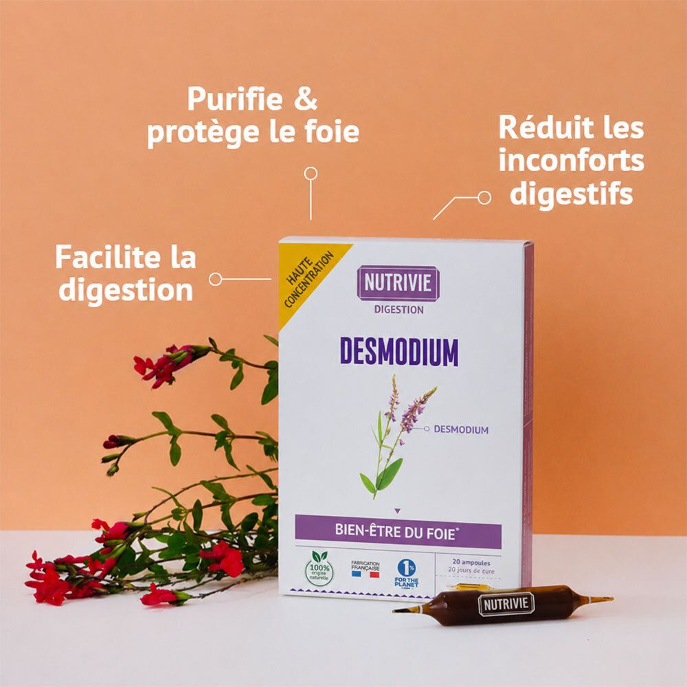 Boîte Nutrivie Desmodium avec ampoules, une ampoule et des plantes à côté.