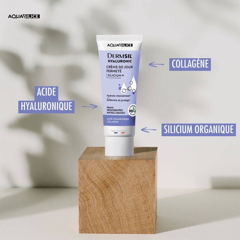 Crème Aquasilice Dermsil Hyaluronic sur un bloc de bois, avec des flèches indiquant des ingrédients comme le collagène et l'acide hyaluronique.