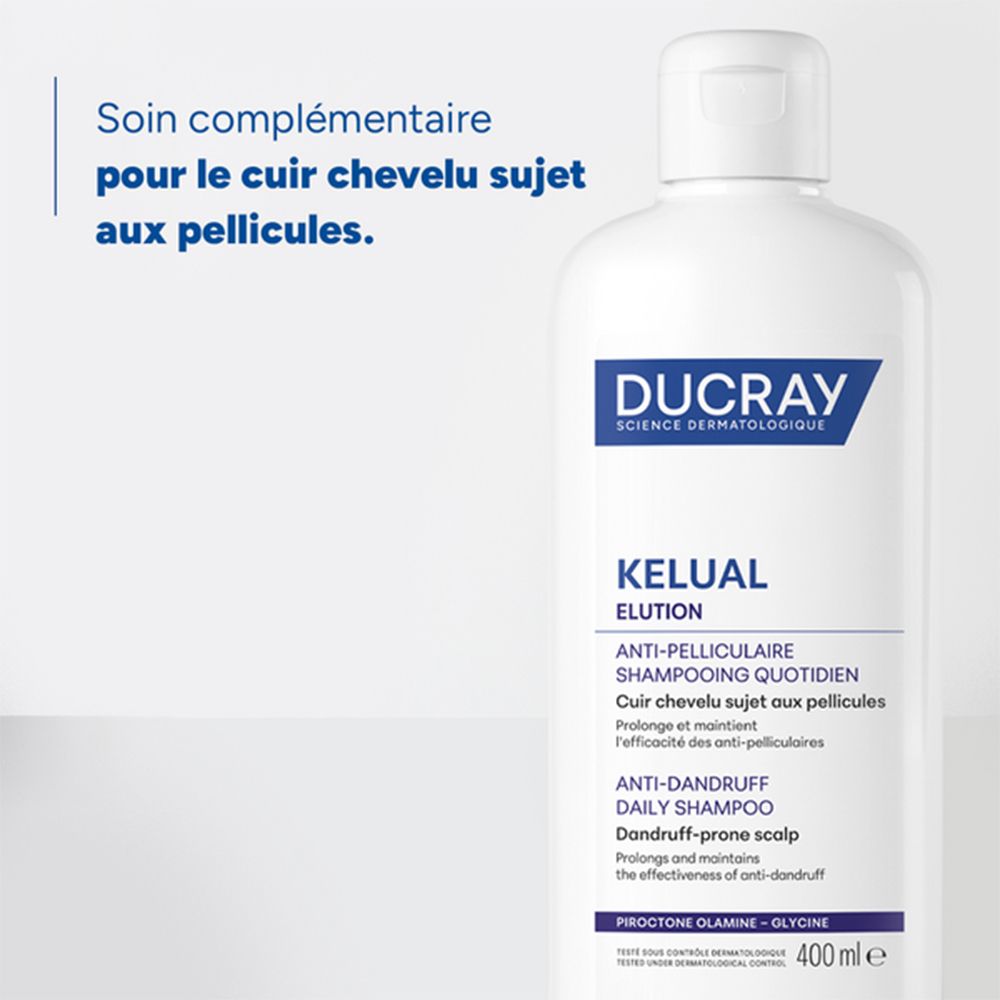 Flacon blanc DUCRAY KELUAL ELUTION. Texte: Soin complémentaire pour cuir chevelu sujet aux pellicules. Info.