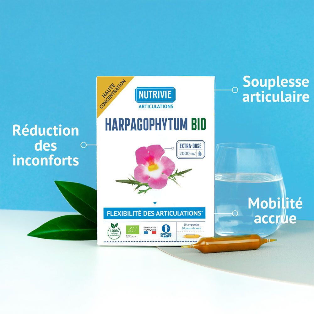 Boîte Nutrivie Harpagophytum Bio à côté d'un verre d'eau et d'une ampoule.