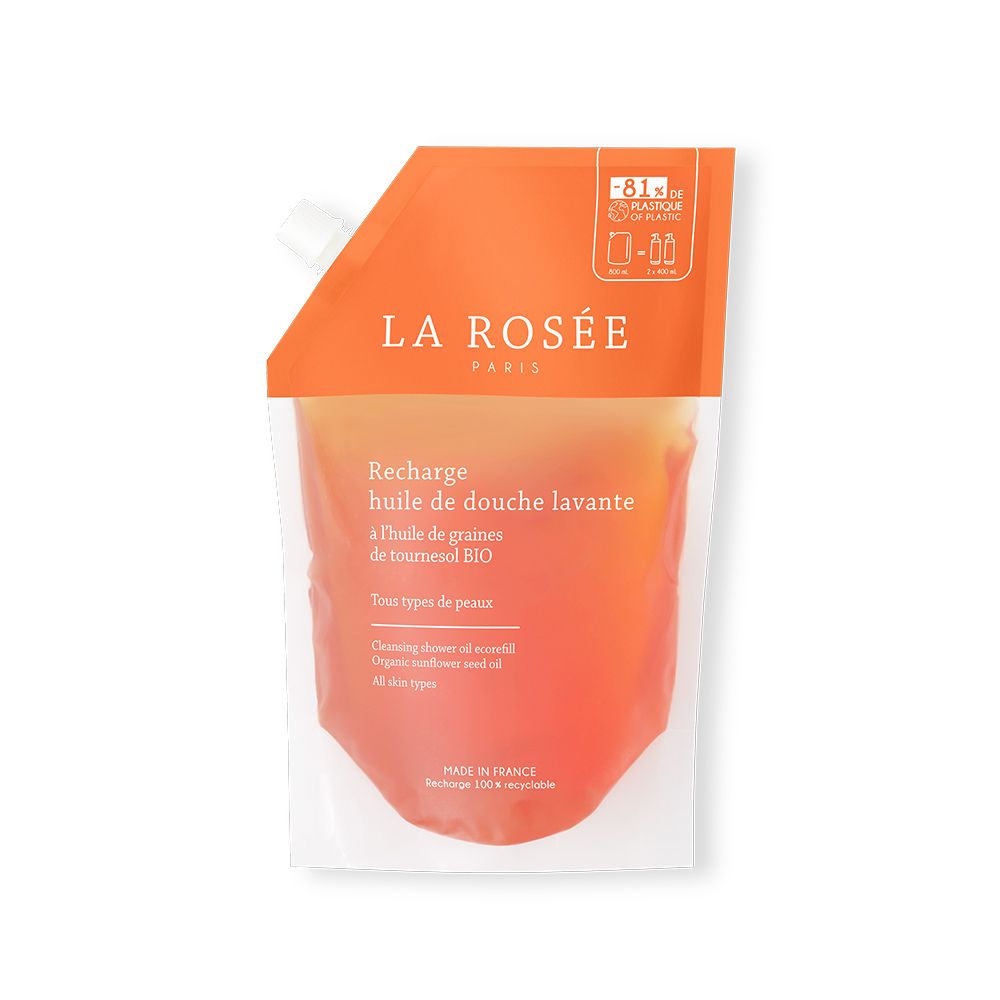 Recharge LA ROSÉE. Sachet orange avec nom et texte du produit. Contient de l'huile de tournesol. 100% recyclable.