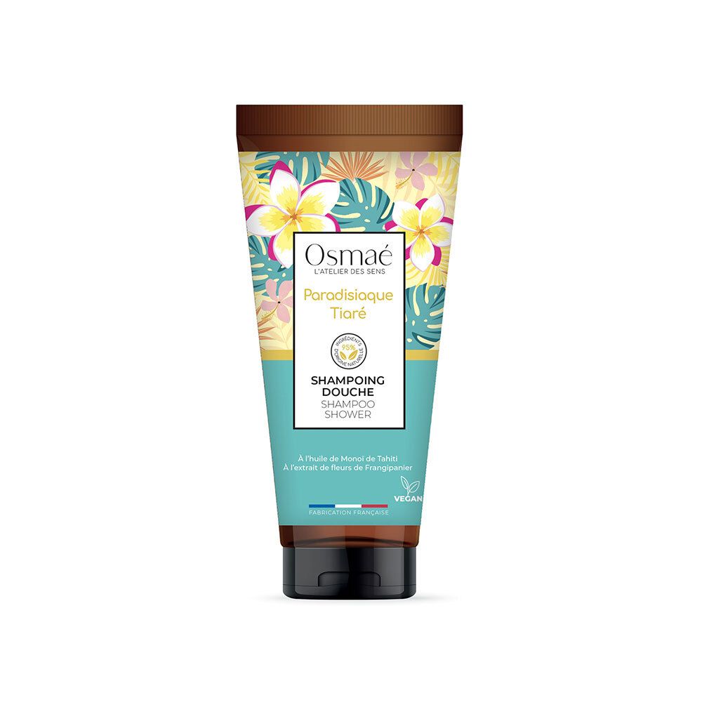 Tube de shampooing avec motifs floraux. Marron en haut, turquoise en bas. Texte: Osmaé, Paradisiaque Tiaré, Shampooing Douche, Vegan.