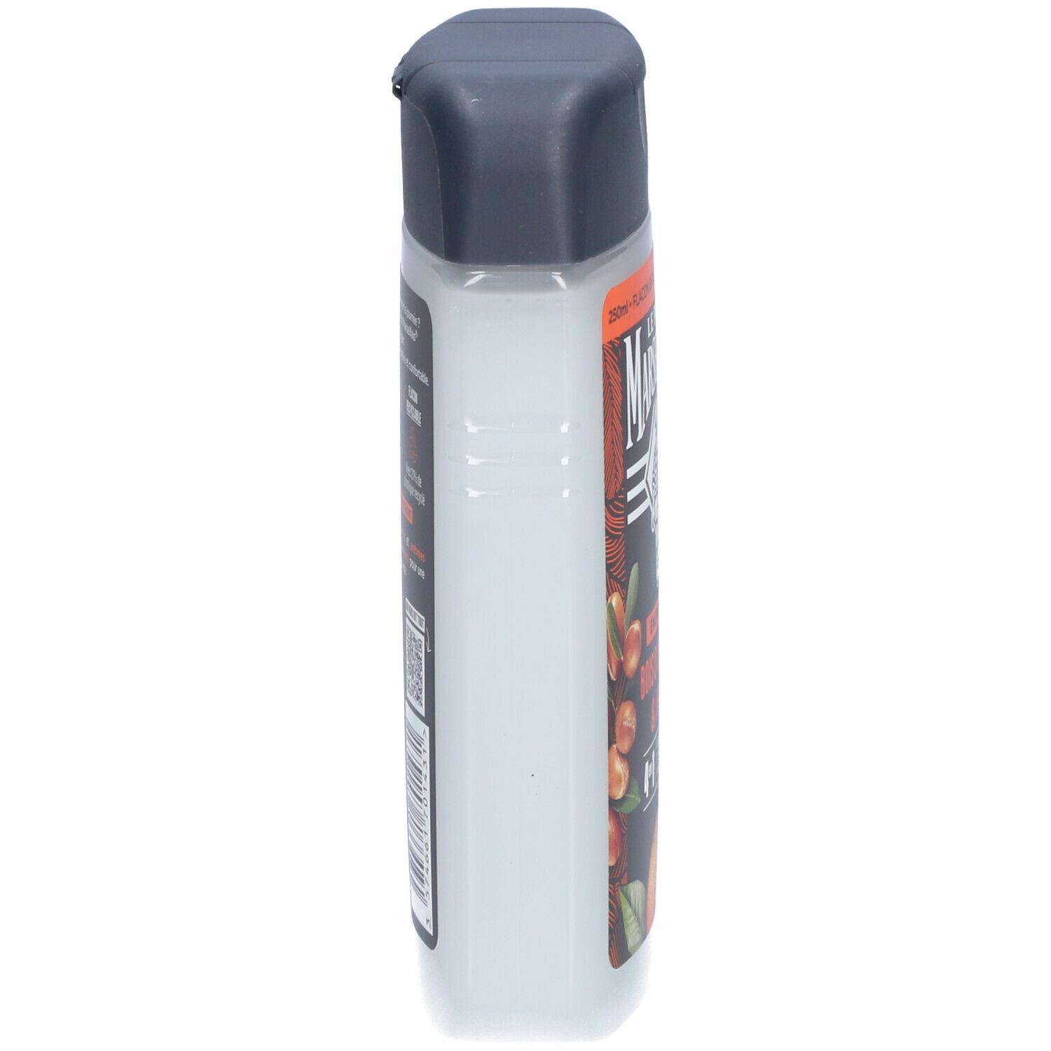 Gel douche Le Petit Marseillais, vue latérale. Bouchon gris, flacon transparent. Informations produit sur l'étiquette.