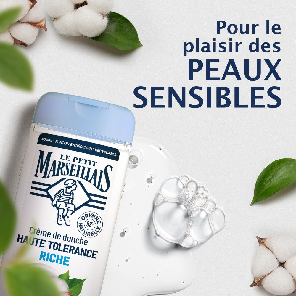 Crème de douche Fleur de Coton et bulles de savon. Texte: Pour peaux sensibles.