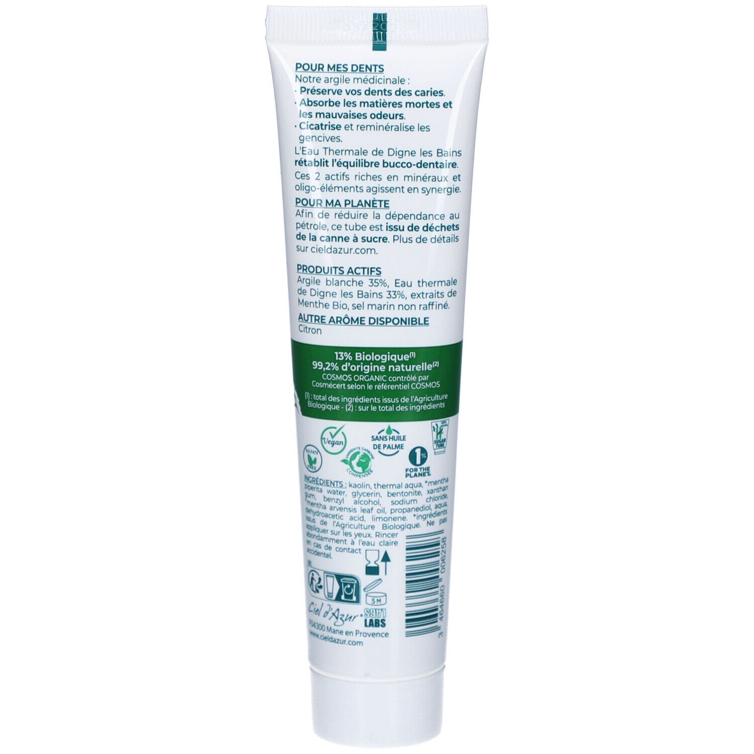 Dos du tube de dentifrice. Texte en plusieurs langues. Informations sur les ingrédients et la certification bio.