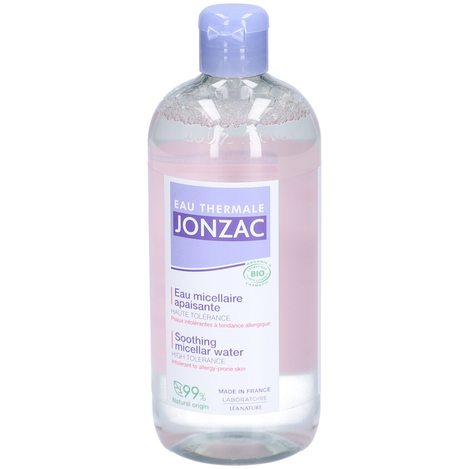 Flacon transparent avec bouchon bleu. Étiquette avec nom du produit et label bio. Textes français et anglais.