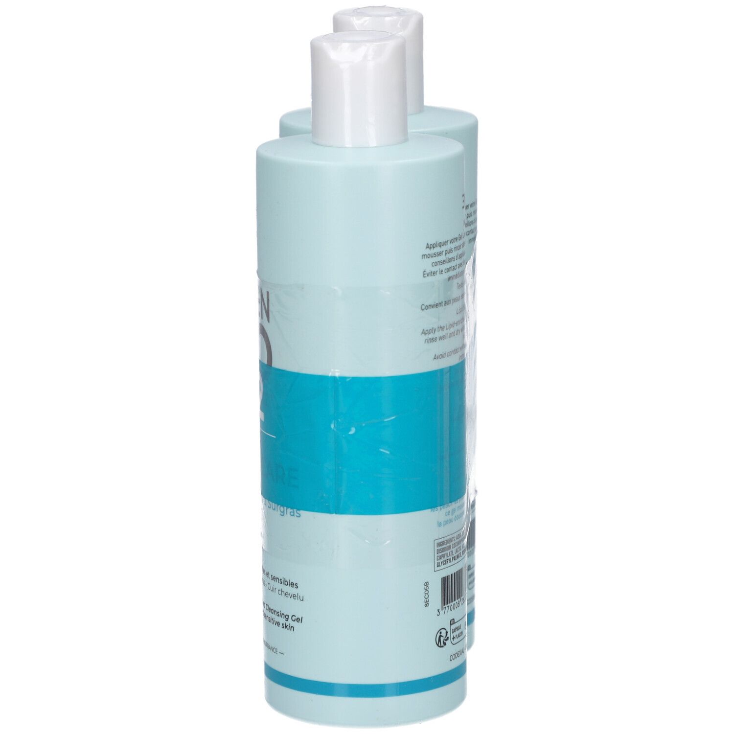 Deux flacons bleu clair avec bouchons blancs, partiellement emballés. Inscription : ENOCARE, informations produit.