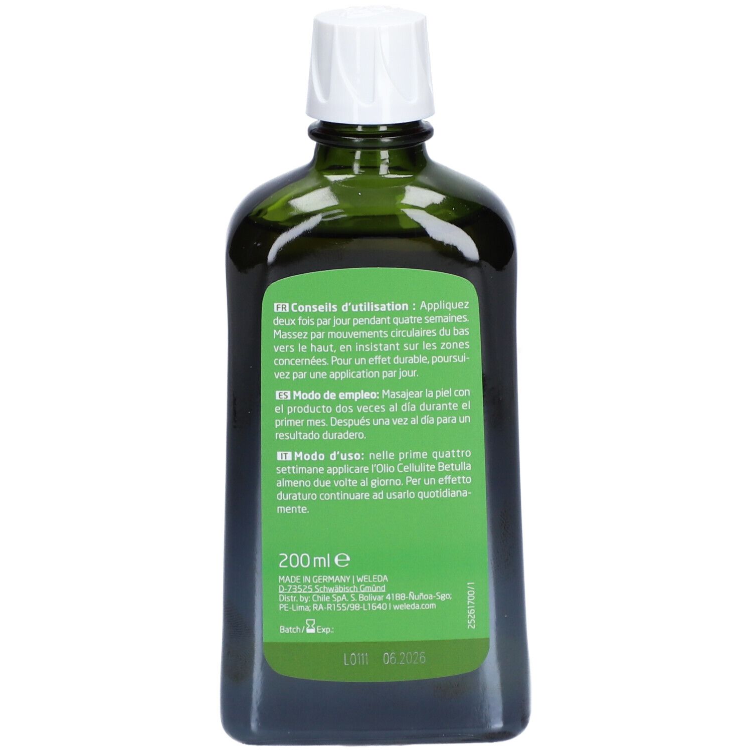 Dos du flacon en verre vert. Texte en plusieurs langues. Informations sur le produit, adresse du fabricant et numéro de lot.