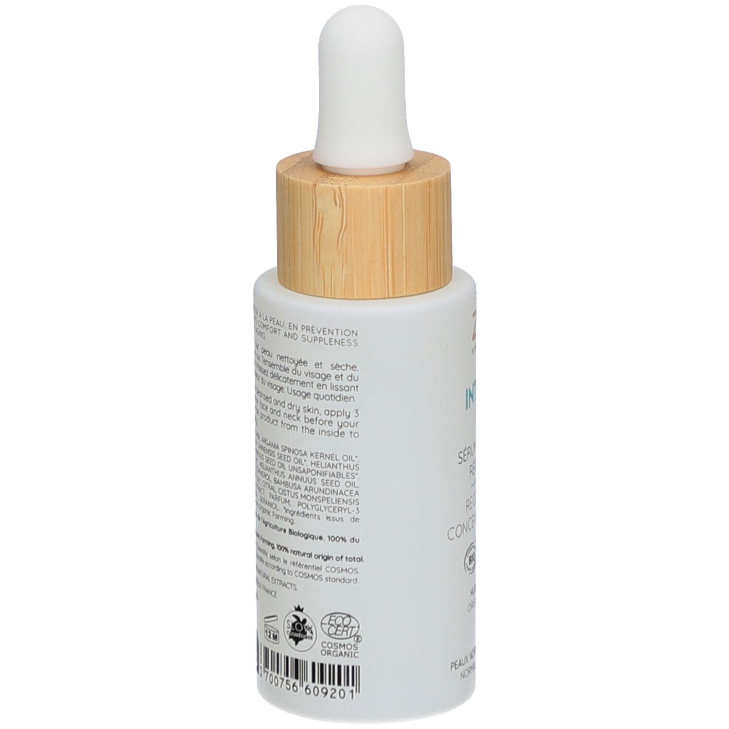 Flacon de sérum blanc avec bouchon en bois et pipette. Dos avec texte et certifications. Inscription: ZAO.