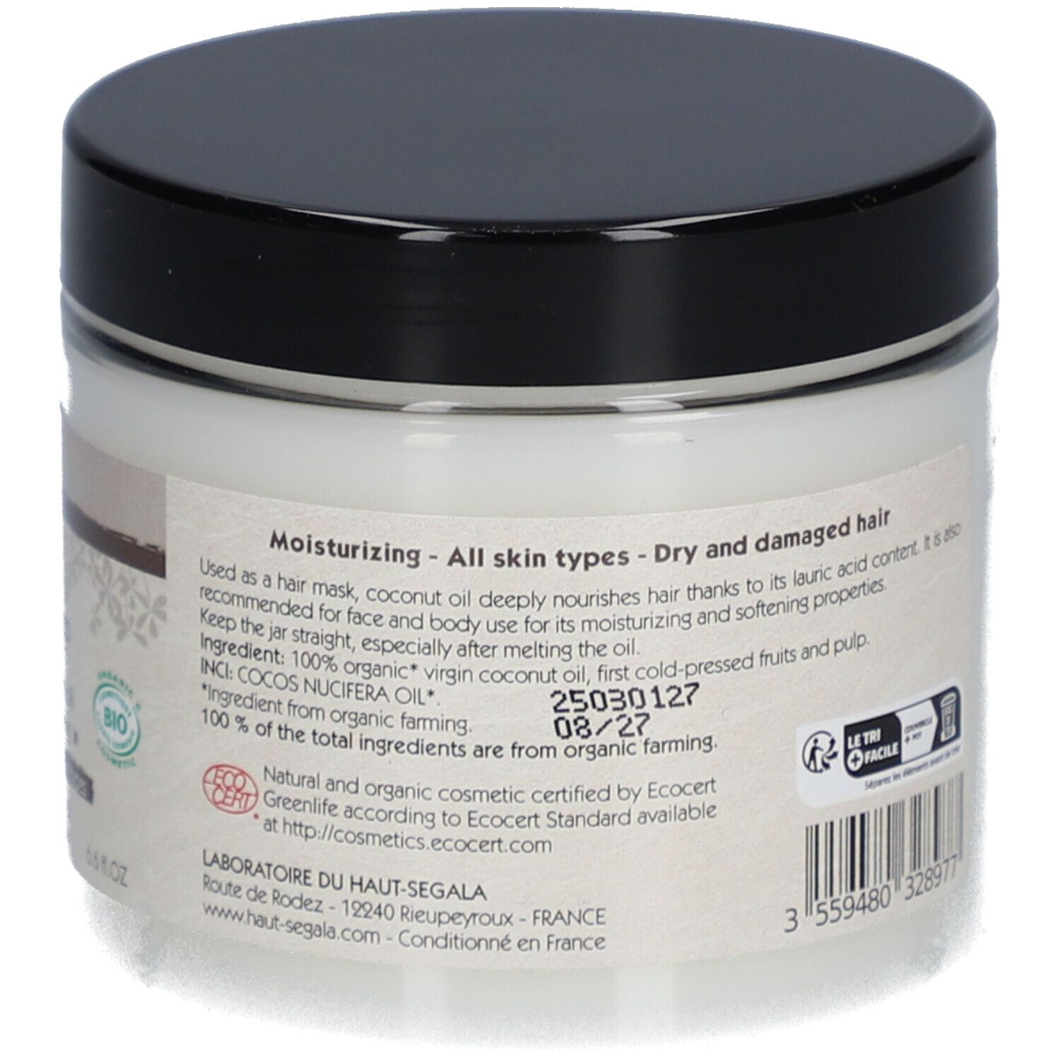 Dos du pot d'huile de coco. Couvercle noir, étiquette blanche avec informations. Texte sur ingrédients et utilisation.