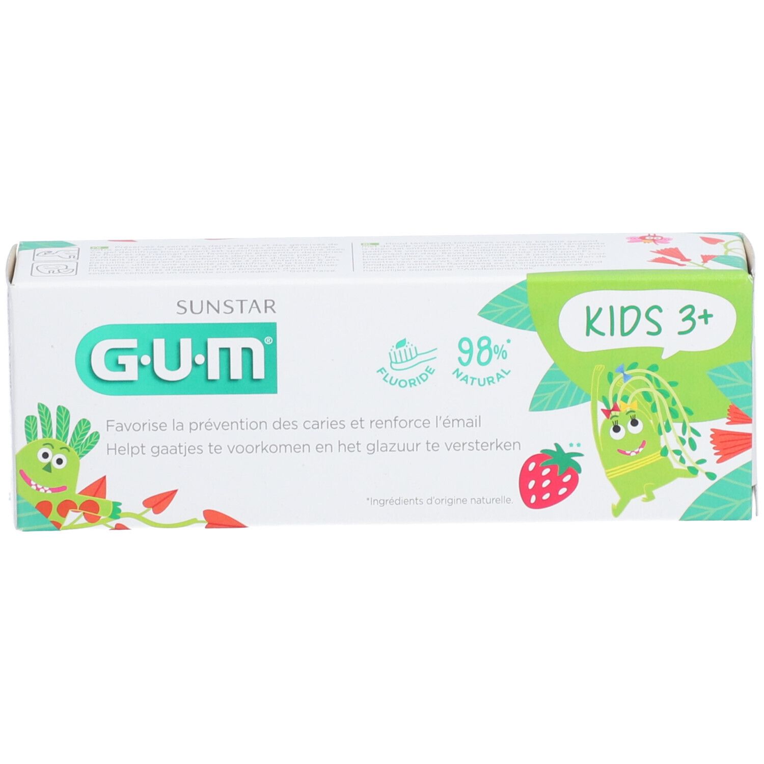 Boîte blanche de dentifrice. Inscription 'KIDS 3+' et 'G.U.M'. Contient 98% d'ingrédients naturels et du fluorure. Avec illustrations de dessins animés.