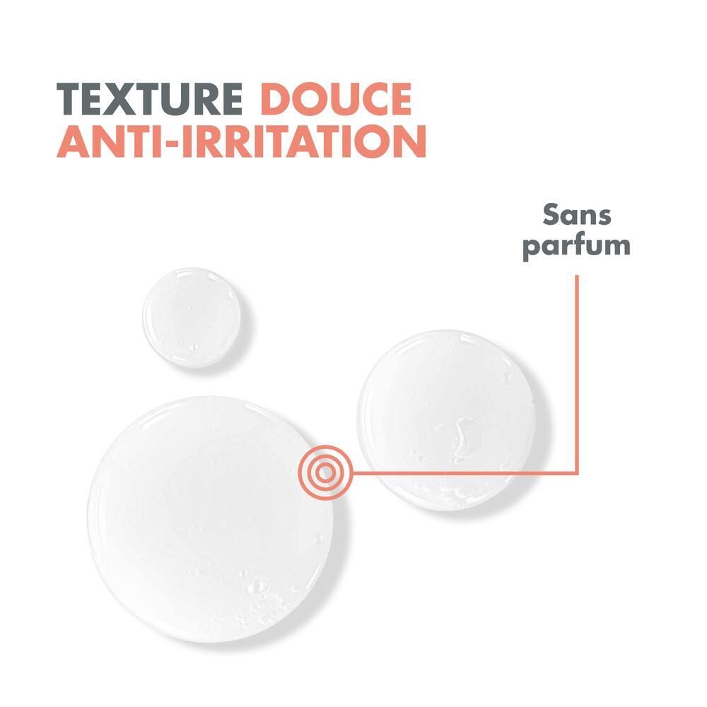Trois gouttes d'un liquide transparent. Texte : texture douce, anti-irritation, sans parfum.