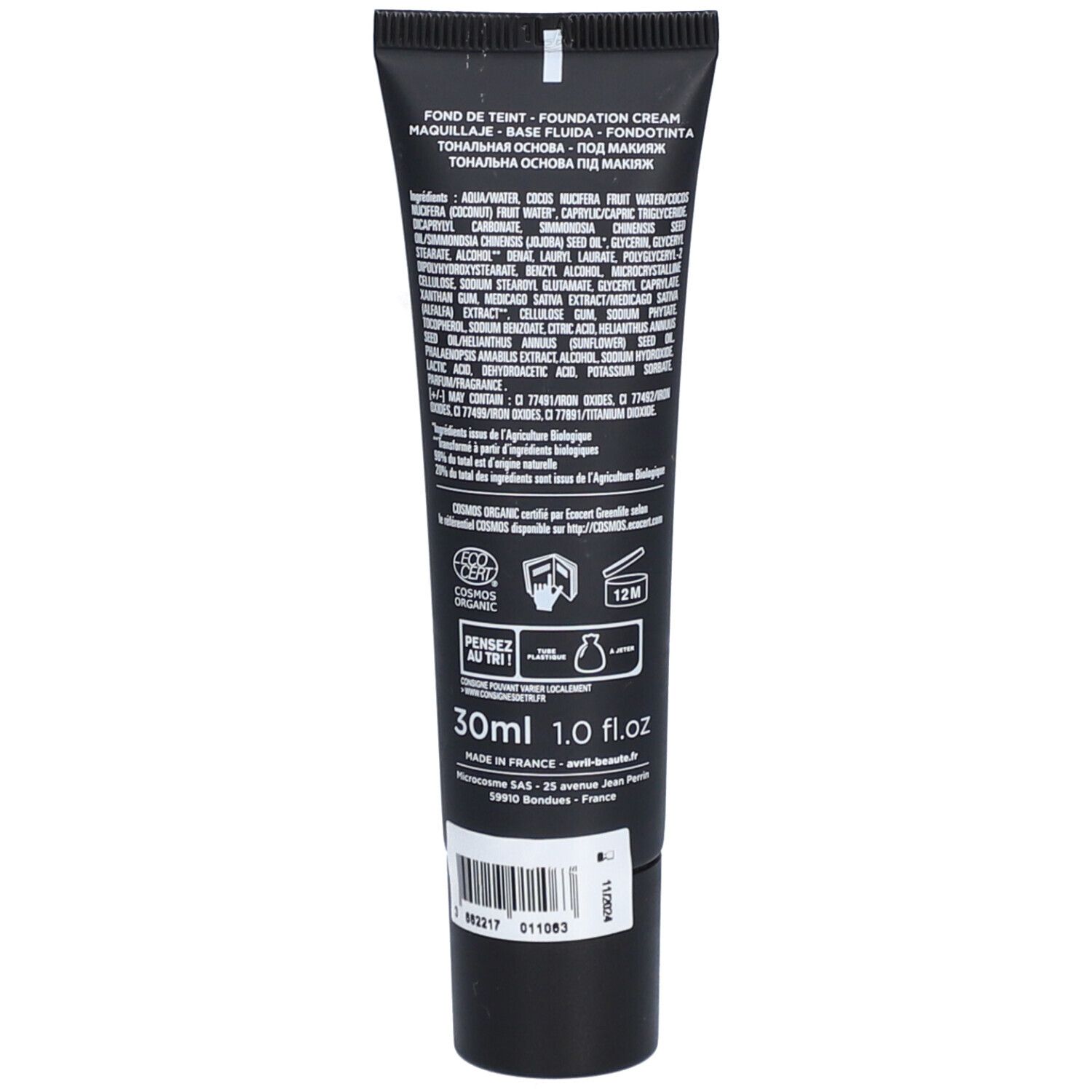 Dos d'un tube de fond de teint noir. Texte avec ingrédients et certifications. Volume: 30ml.