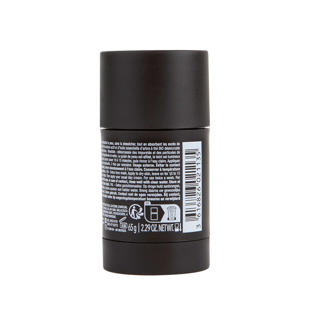 Emballage cylindrique noir. Texte en français. Contient des informations sur les ingrédients et l'utilisation du produit.