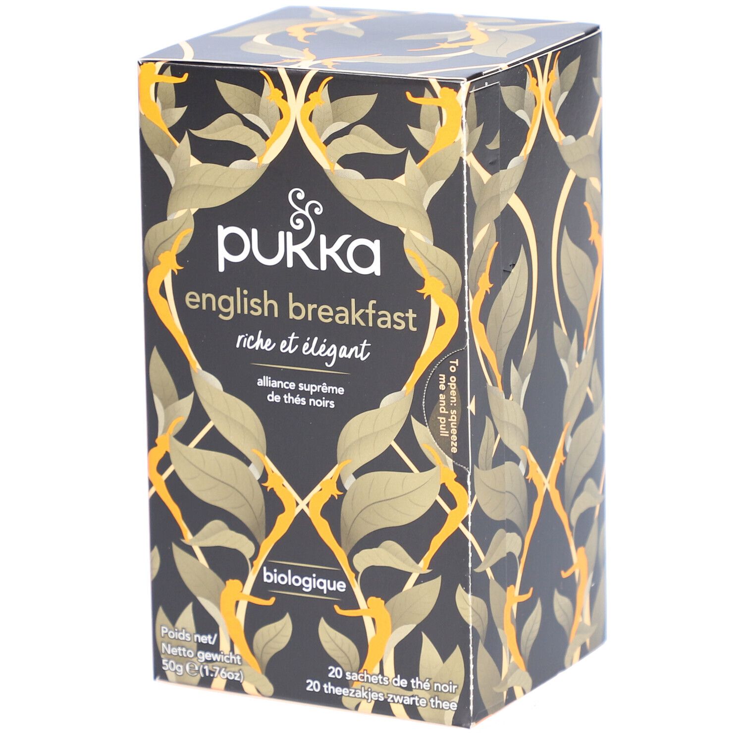 Boîte de thé noire avec motif de feuilles dorées. Inscription : Pukka English Breakfast, biologique. 20 sachets.