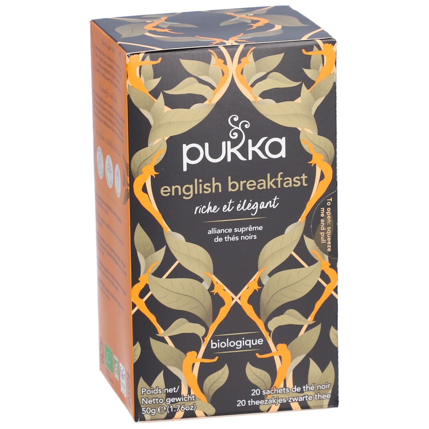Boîte de thé avec motif de feuilles dorées. Inscription : Pukka English Breakfast, biologique. 20 sachets.