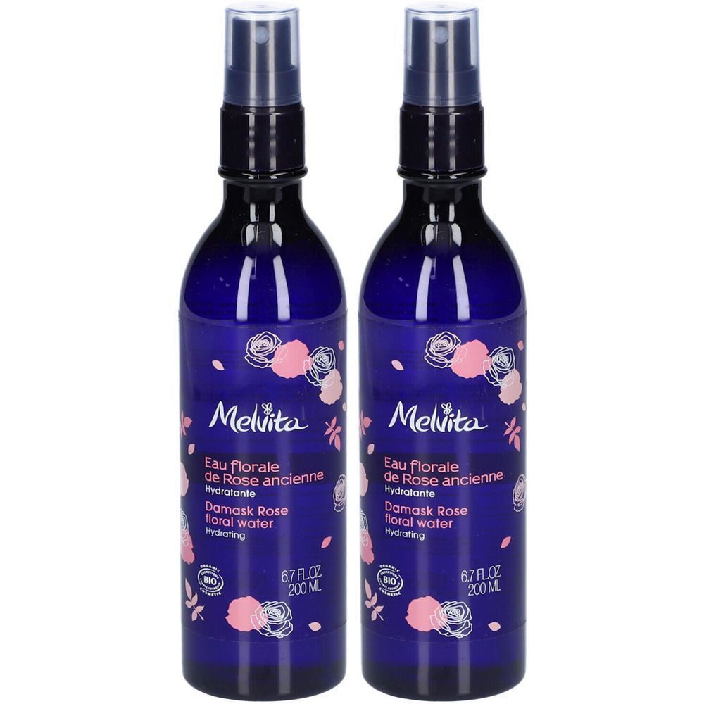 Deux flacons spray d'eau florale de rose Melvita avec un design floral.