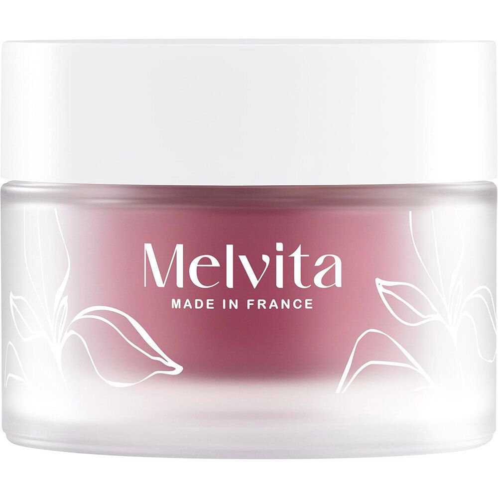 Pot de crème avec couvercle blanc. Inscription Melvita, Made in France. Motif floral.