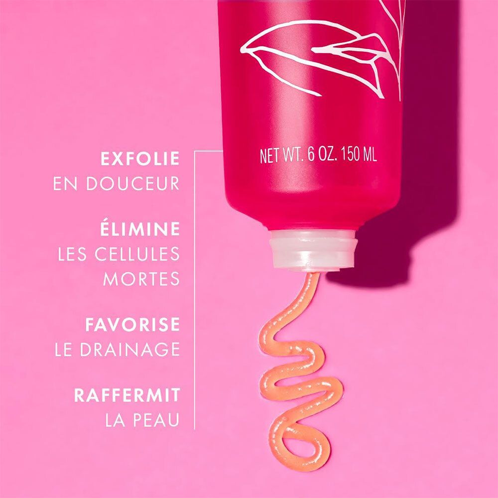 Tube rouge Melvita L'Or Rose, produit sortant. Texte: Exfolie en douceur, Élimine les cellules mortes, etc. Fond rose.