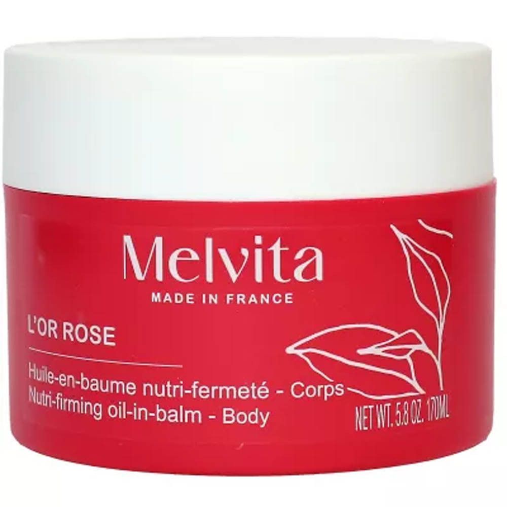 Melvita L'Or Rose baume corps dans un pot rouge avec un couvercle blanc.