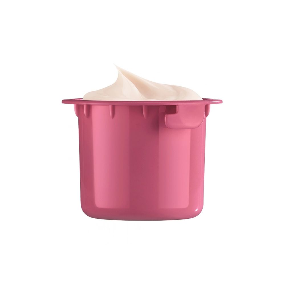 Un petit pot rose contenant une texture crémeuse.