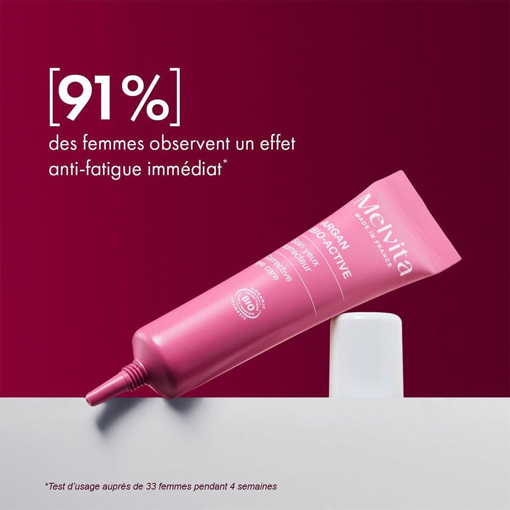 Tube rose avec bouchon blanc. Texte: 91% des femmes observent un effet anti-fatigue immédiat. Melvita Argan Bio-Active. Bio.
