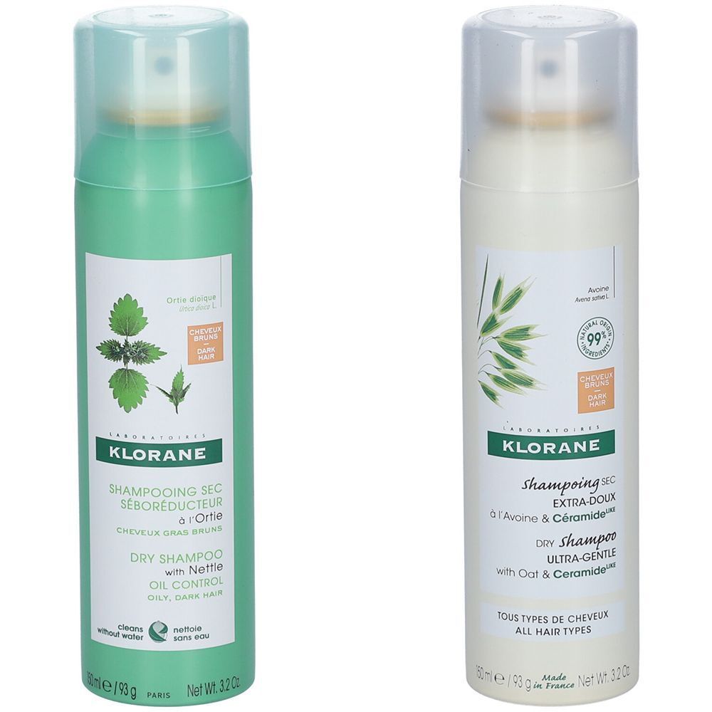 Deux sprays KLORANE, vert et blanc. Vert : shampooing sec à l'ortie. Blanc : shampooing sec à l'avoine et céramide. Inscriptions et illustrations.