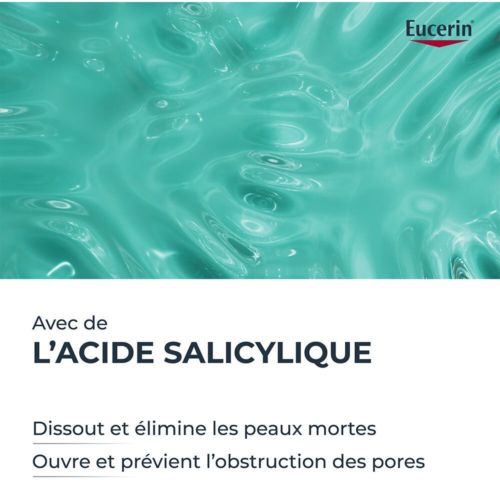 Fond turquoise. Texte : Avec de l'acide salicylique. Dissout et élimine les peaux mortes.