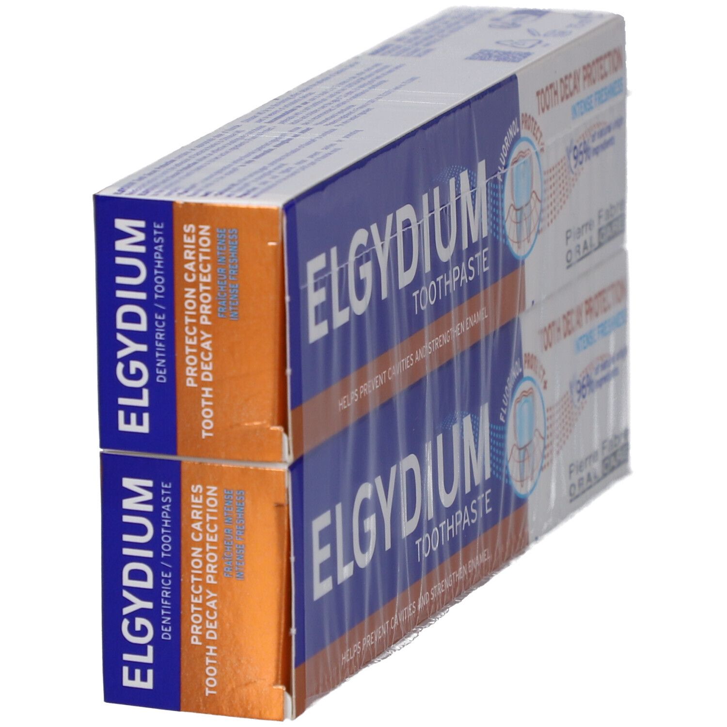 Deux boîtes de dentifrice ELGYDIUM en biais. Emballage bleu et orange. Texte: "Tooth Decay Protection".