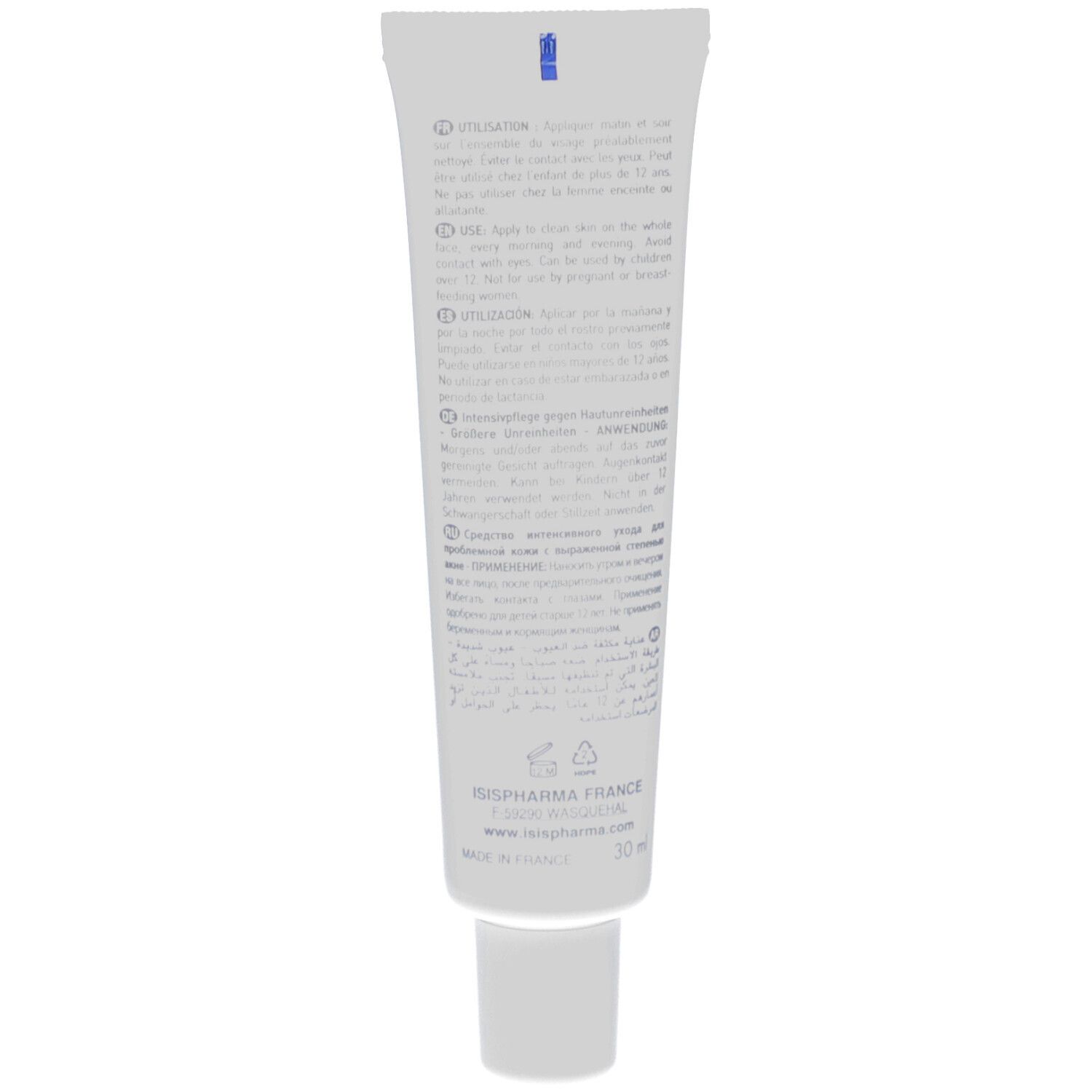 Dos du tube blanc. Texte multilingue. Contient des informations sur l'utilisation et les ingrédients.