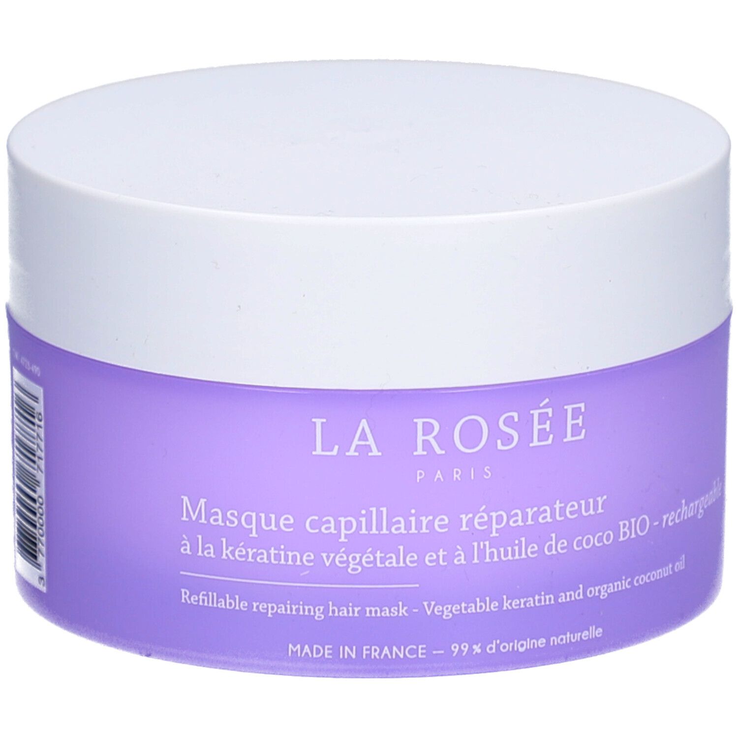 Pot rond avec couvercle blanc et étiquette violette. Texte: La Rosée Paris, Masque capillaire réparateur, à la kératine végétale.
