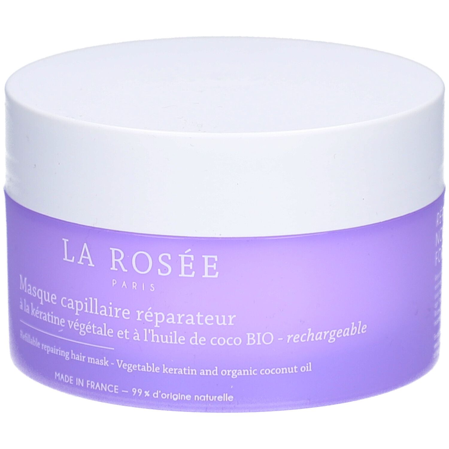 Pot rond avec couvercle blanc et étiquette violette. Texte: La Rosée Paris, Masque capillaire réparateur, à la kératine végétale.