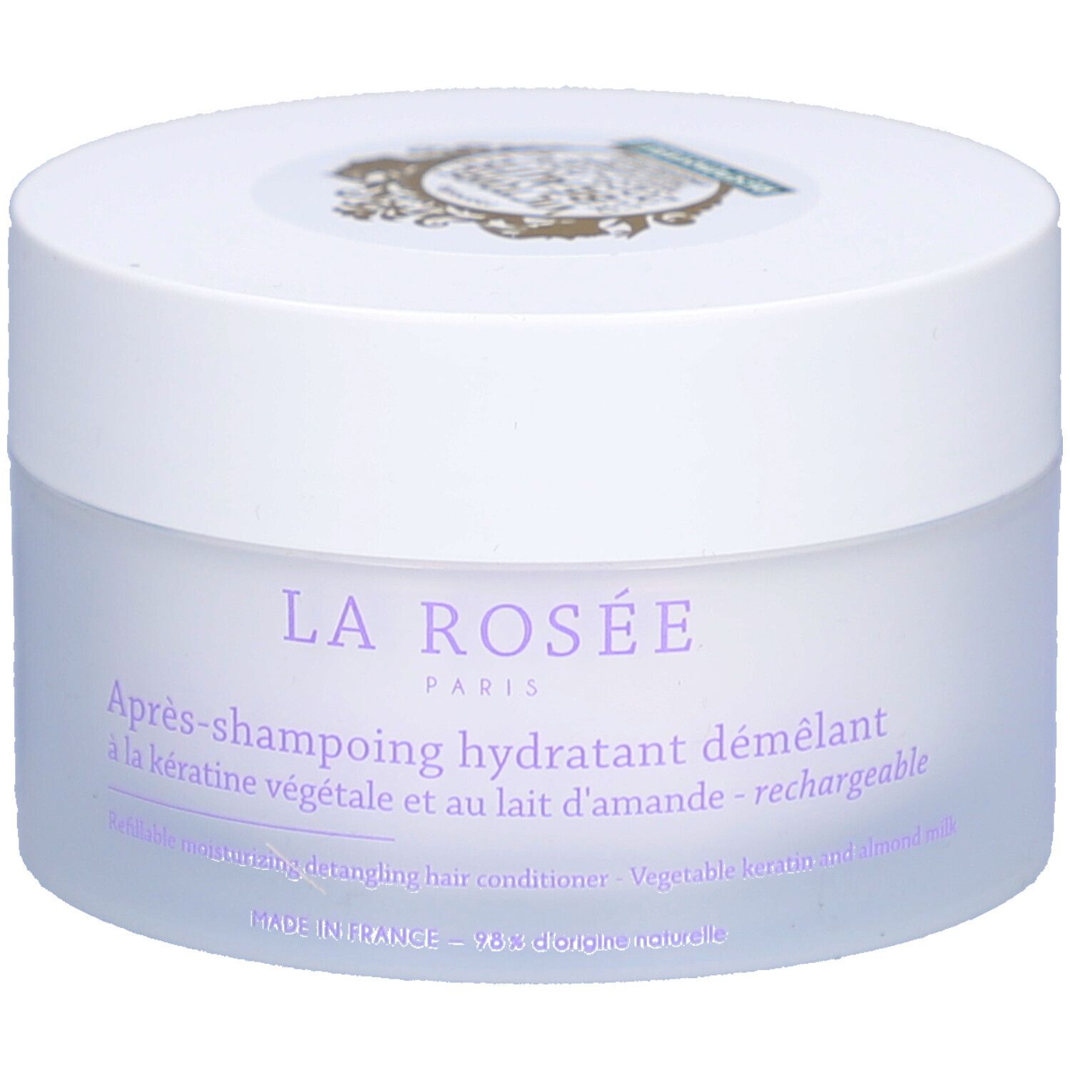 Pot blanc avec couvercle. Inscription : La Rosée Paris, Après-shampoing hydratant démêlant. Kératine végétale et lait d'amande.