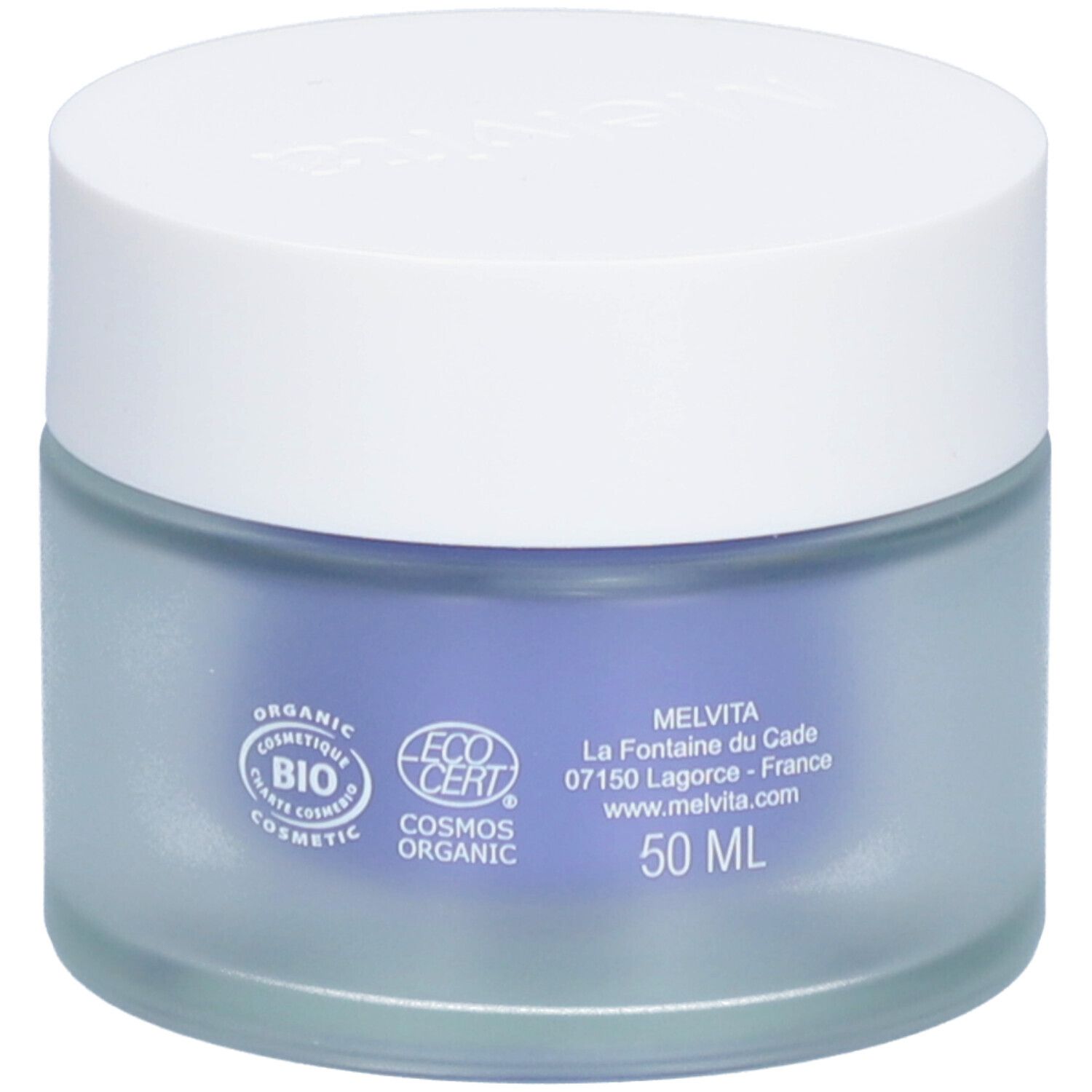 Pot rond avec couvercle blanc. Logos et texte sur le verre bleu. Contenu de 50 ml. Fabriqué en France.