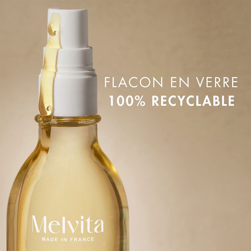 Flacon d'huile Melvita L'Or Bio. Texte: Flacon en verre 100% recyclable.