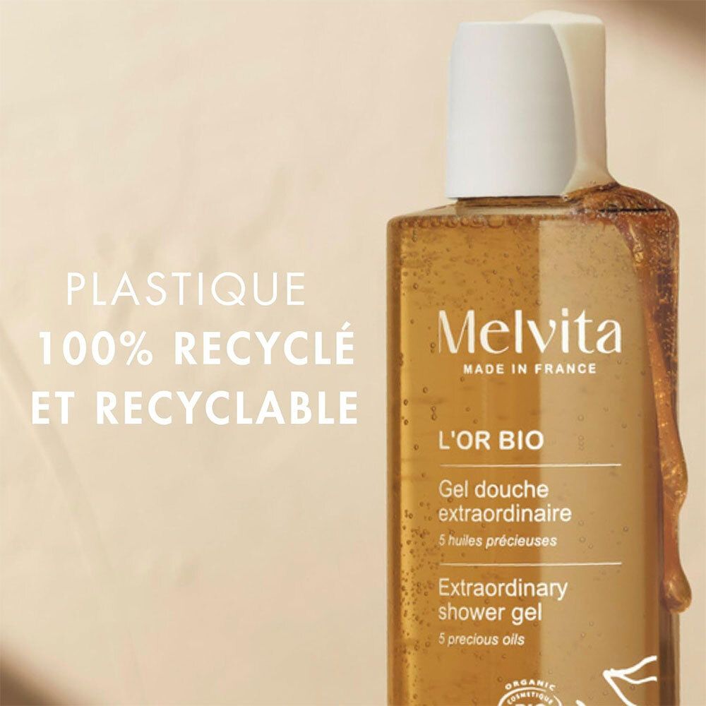 Melvita L'Or Bio Gel Douche Extraordinaire. Flacon avec texte: 100% recyclé et recyclable.