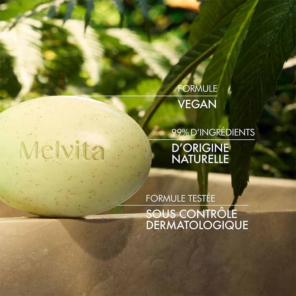 Savon avec 'Melvita' et texte: Formule vegan, 99% d'ingrédients d'origine naturelle, Formule testée sous contrôle dermatologique.