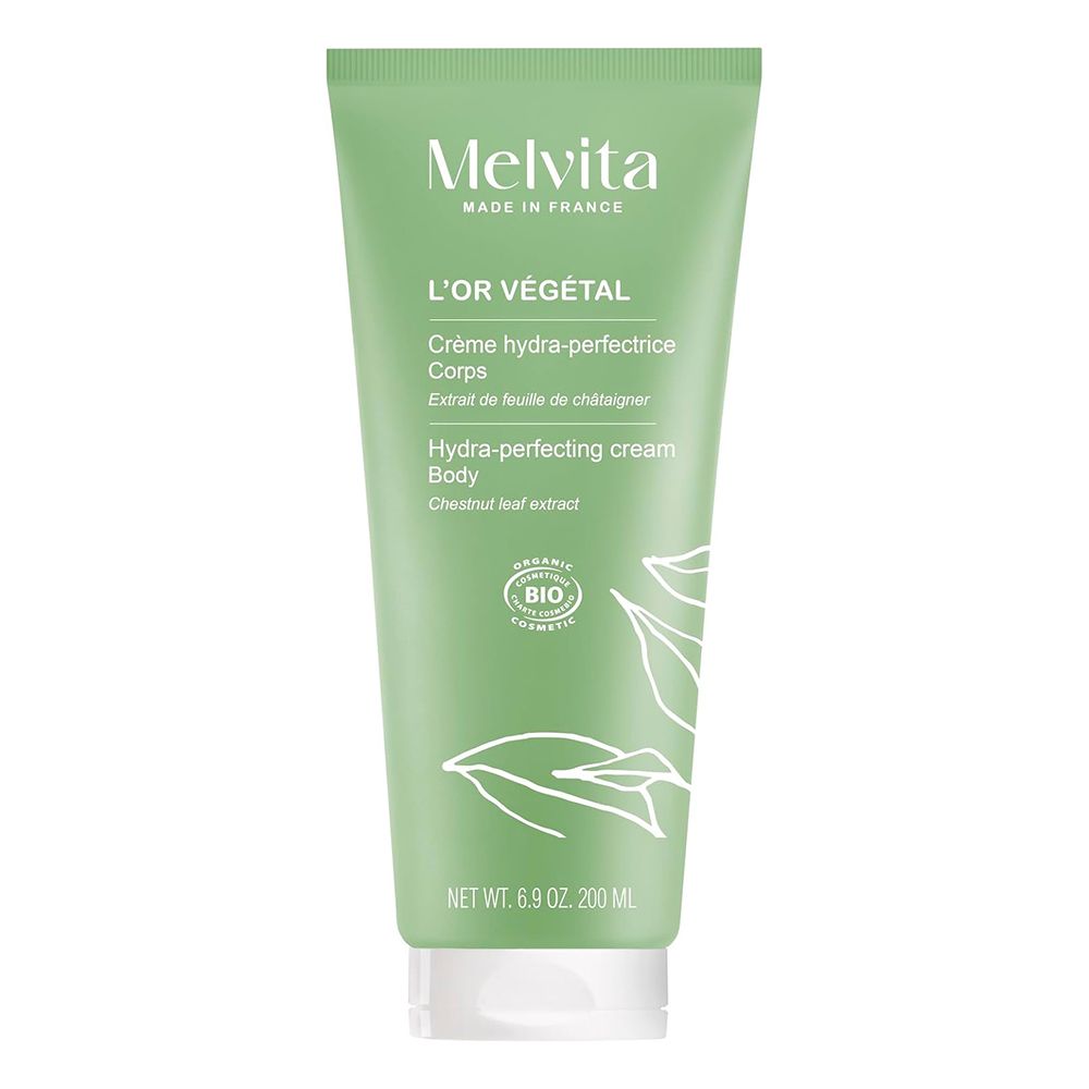 Tube vert MELVITA L'Or Végétal Hydra-Perfector Body Cream. Nom du produit et ingrédients. Certification biologique.