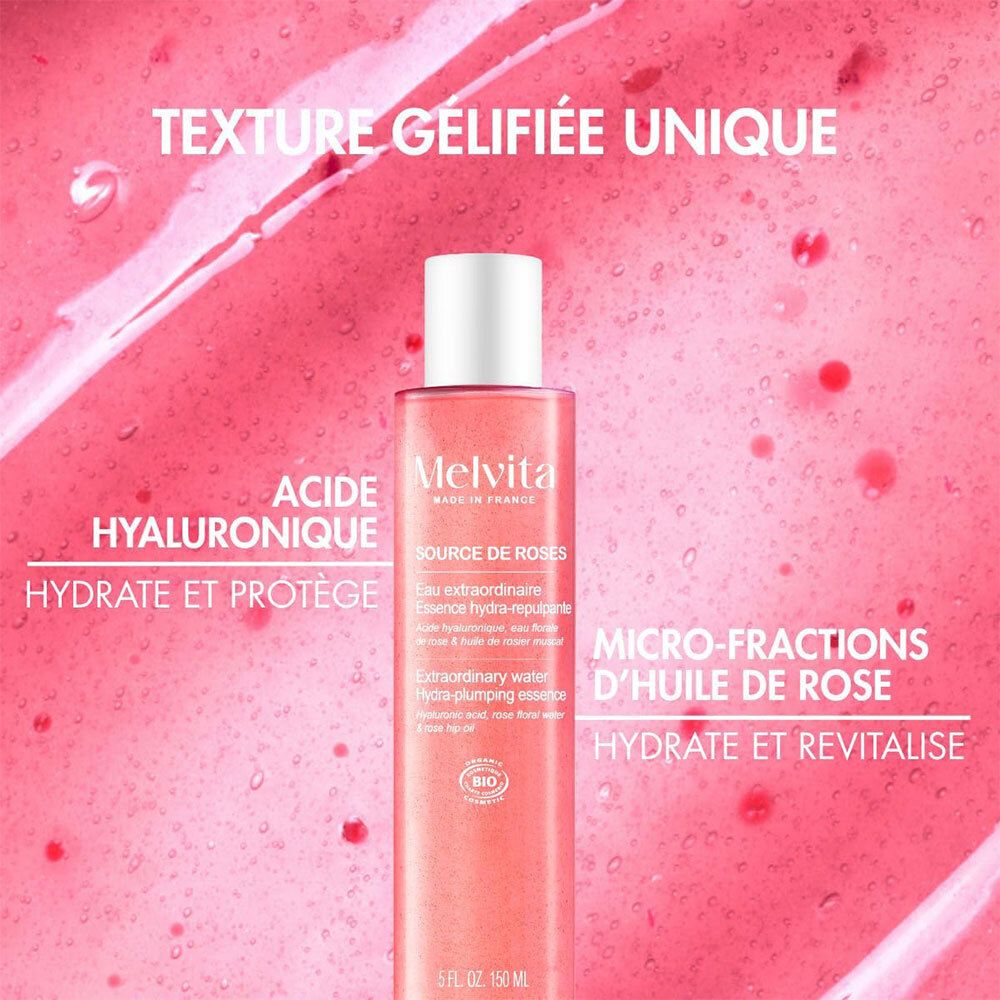 Flacon d'essence de rose avec bouchon blanc. Texte: Acide hyaluronique, hydrate et protège.