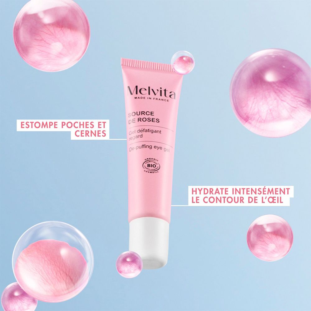 Tube de gel pour les yeux rose, entouré de bulles roses. Texte : Hydrate intensément le contour de l'œil.
