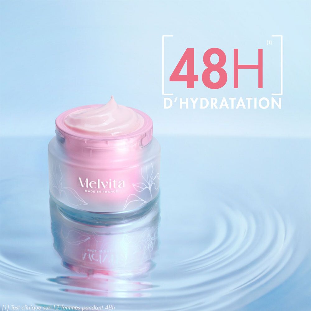 Produit avec crème rose dans l'eau. Texte : 48H D'HYDRATATION. Logo Melvita. Crème rose sur le couvercle.