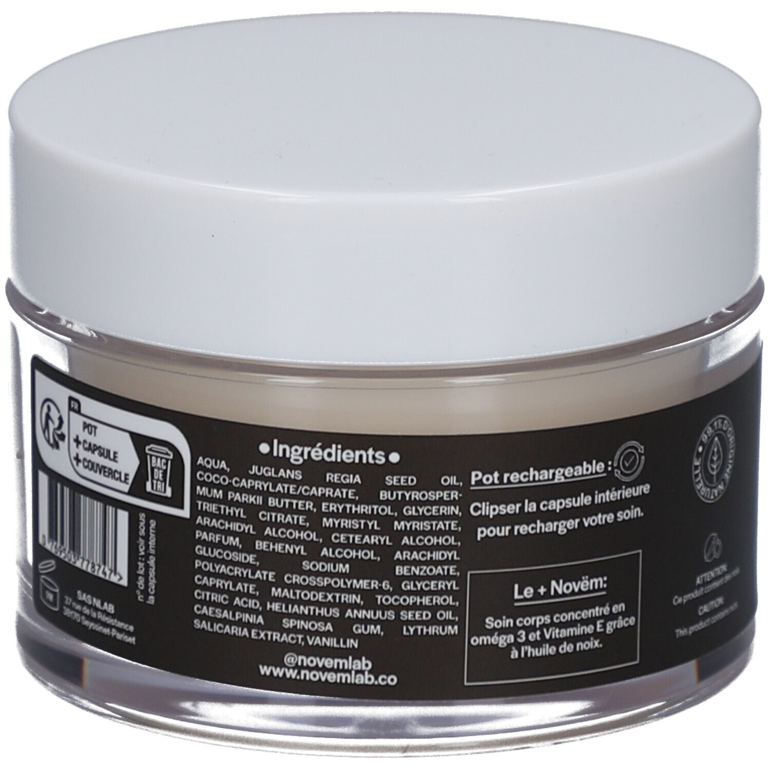 Dos du pot de crème. Étiquette noire avec ingrédients et texte: Pot rechargeable, Le+Novëm. Couvercle blanc, verre transparent.