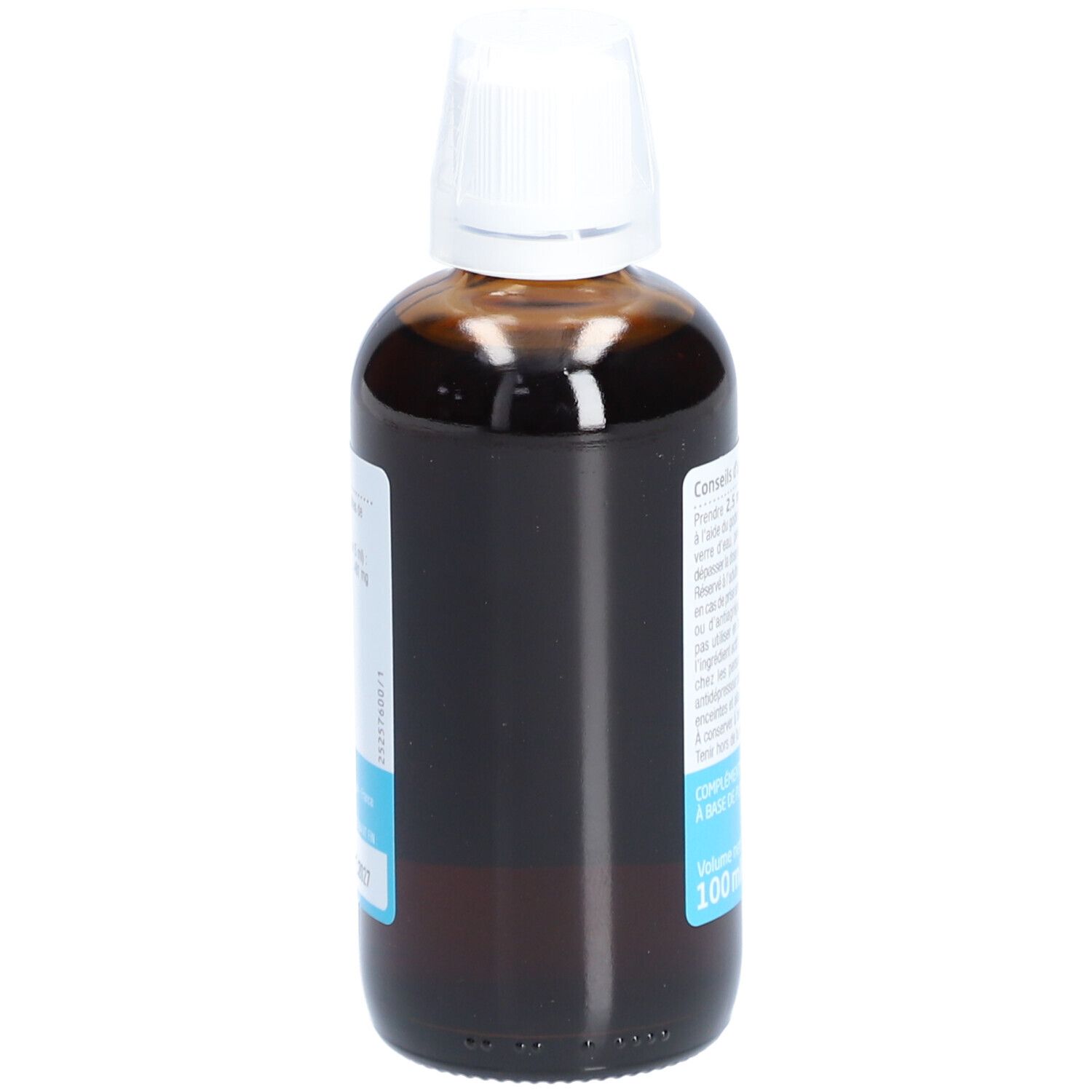 Flacon en verre brun avec bouchon blanc. Étiquette avec texte. Marque : Weleda. Nom du produit : Mémoire et Concentration. Volume : 100 ml.