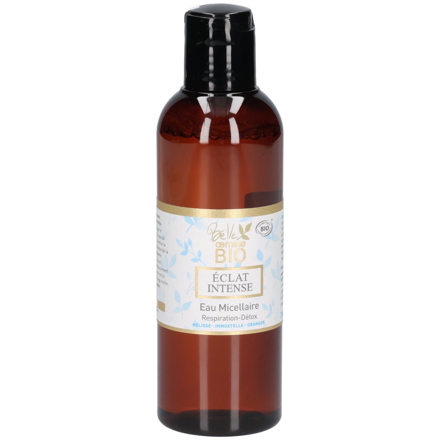 Flacon brun avec bouchon noir, étiquette avec sceau BIO et motif floral.