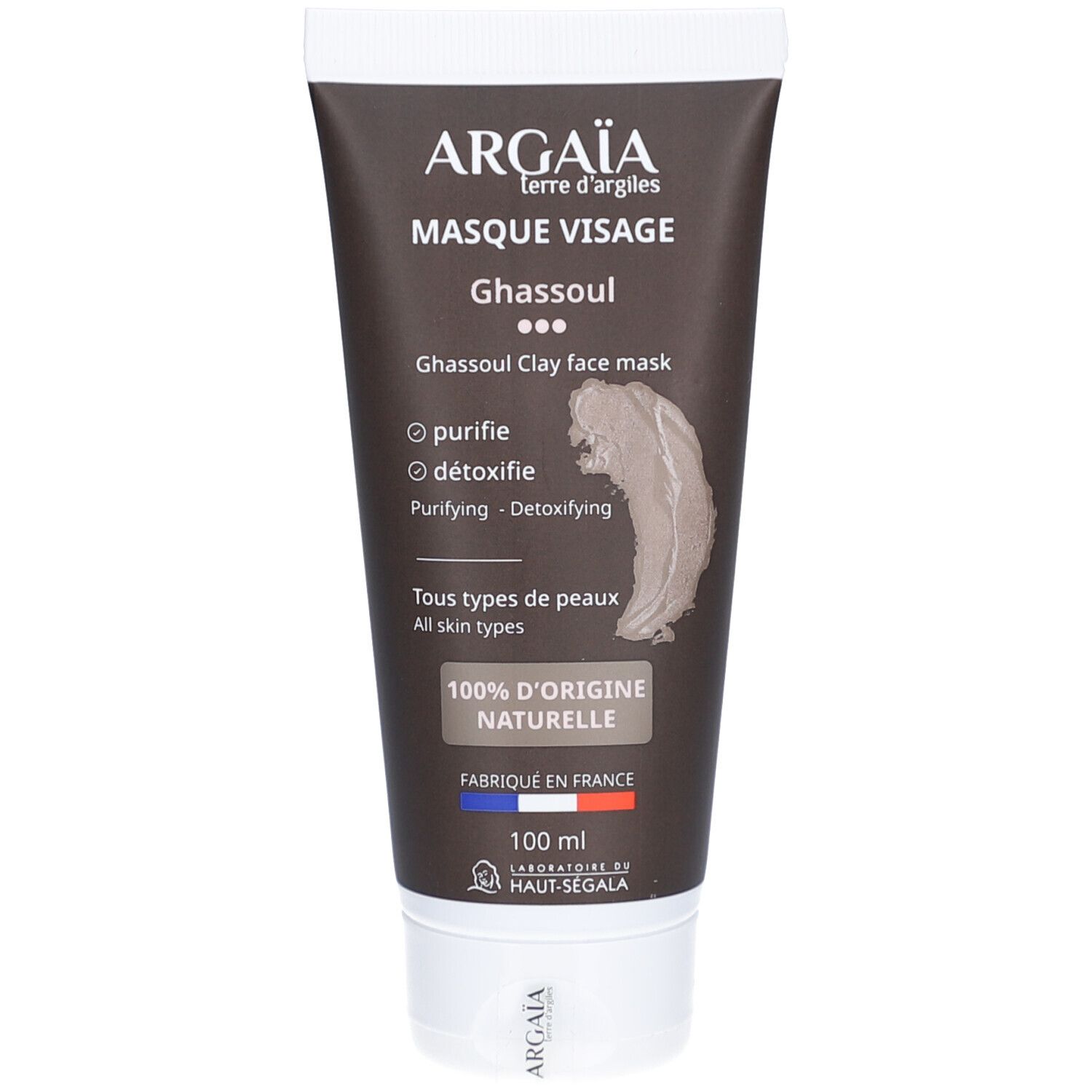Tube de masque visage marron. Inscription: ARGAÏA, Masque Visage Ghassoul. Texte: Purifie, détoxifie. 100% d'origine naturelle. Fabriqué en France.