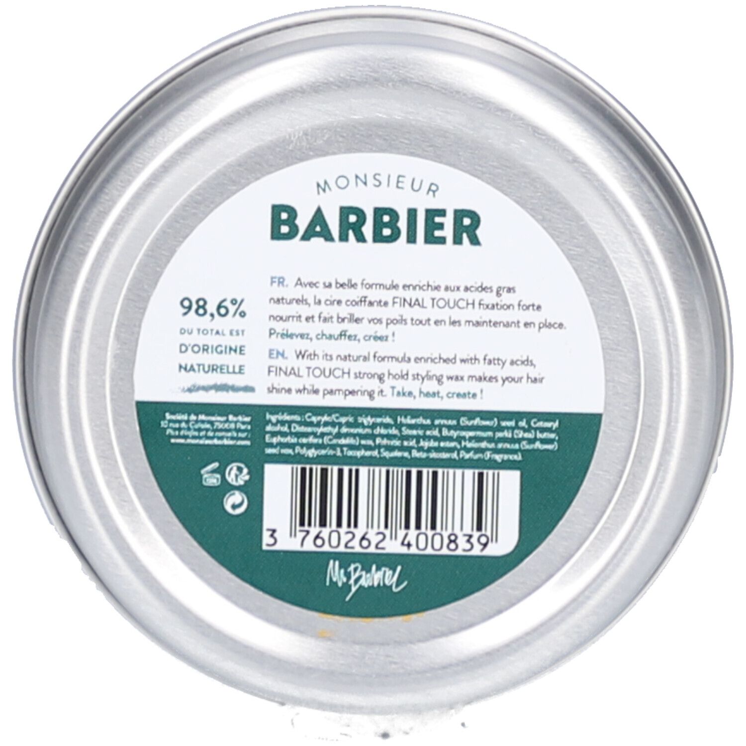Boîte ronde avec étiquette verte. Inscription : "MONSIEUR BARBIER", "98,6% du total est d'origine naturelle". Code-barres.