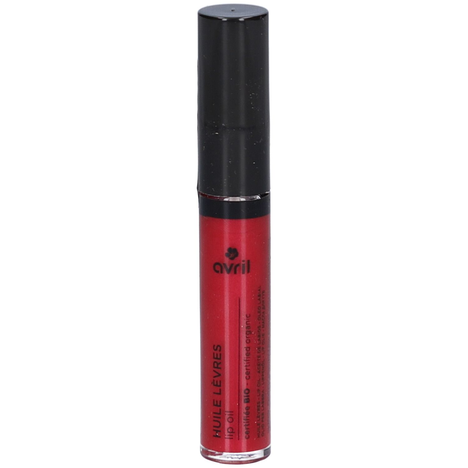 Huile à lèvres rouge dans un tube transparent avec un bouchon noir. Le produit porte le logo Avril et l'inscription "HUILE LEVRES".