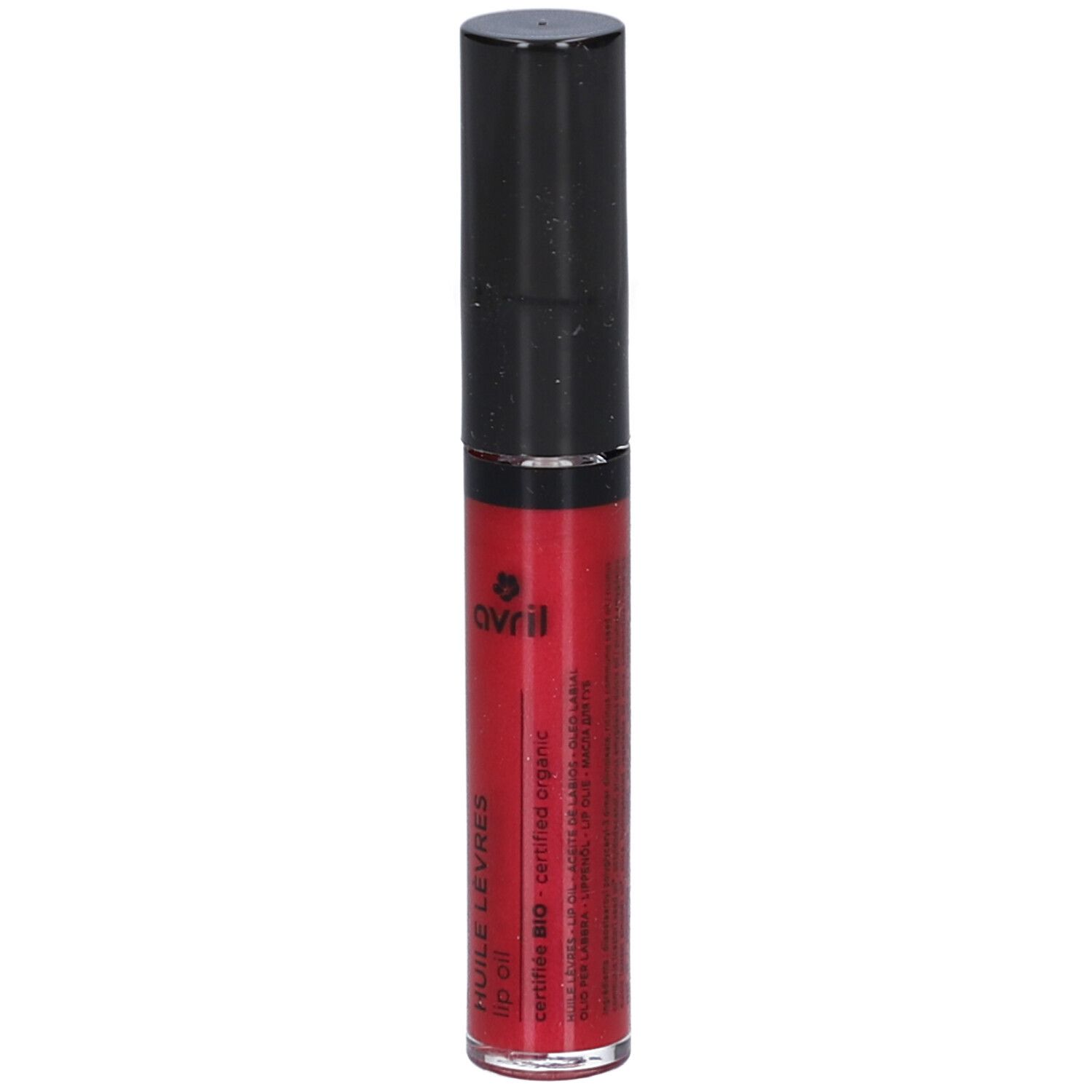 Huile à lèvres rouge dans un tube transparent avec un bouchon noir. Le produit porte le logo Avril et l'inscription "HUILE LEVRES lip oil".